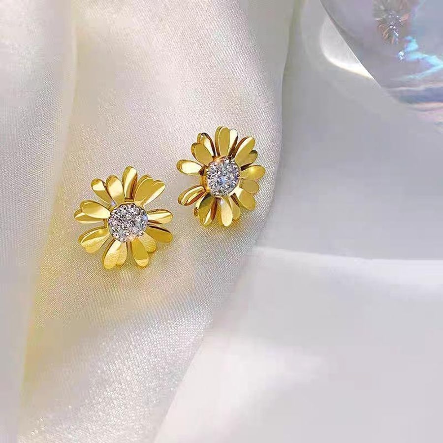 Boucles marguerite dorée et blanche