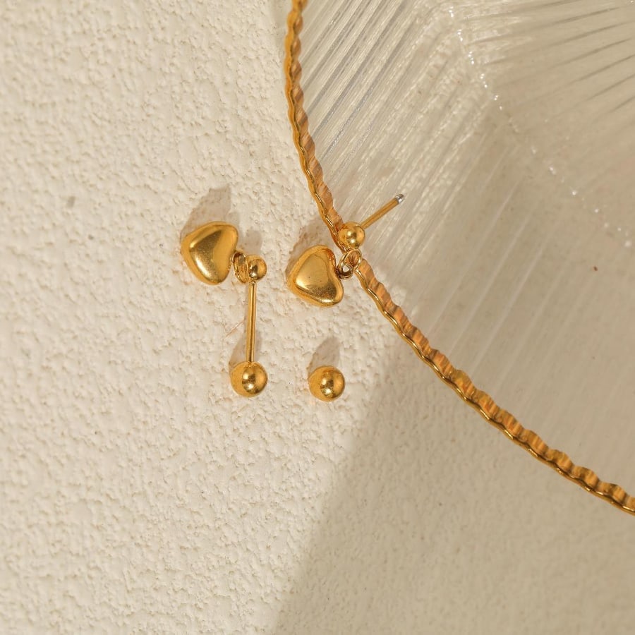 Boucles dorées à pendentifs ronds