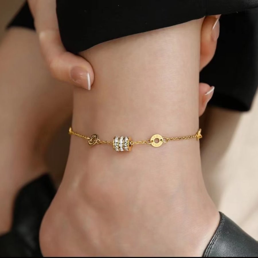Chaîne de cheville dorée à perles claires